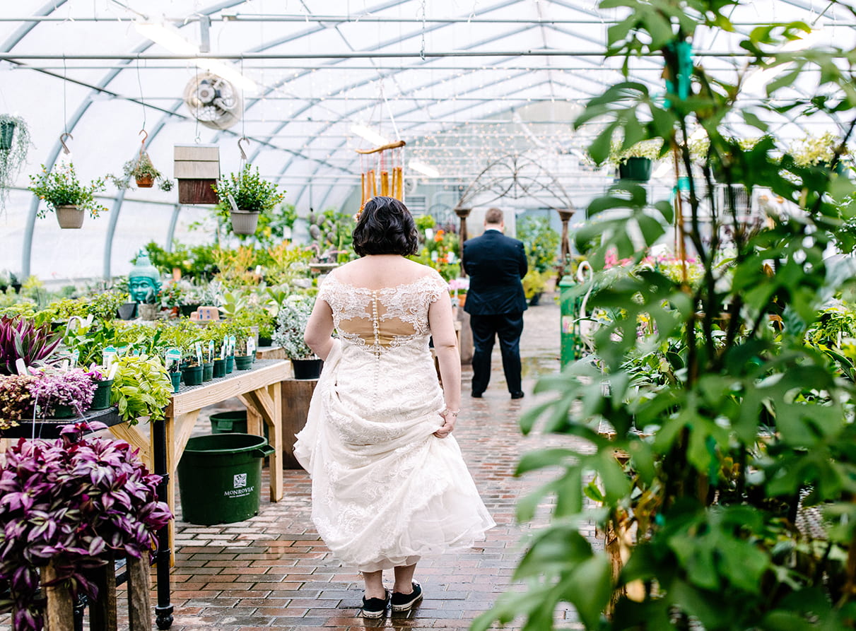 Bride gets ready for first looks with groom at Carol Watson Greenhouse in Lafayette NY