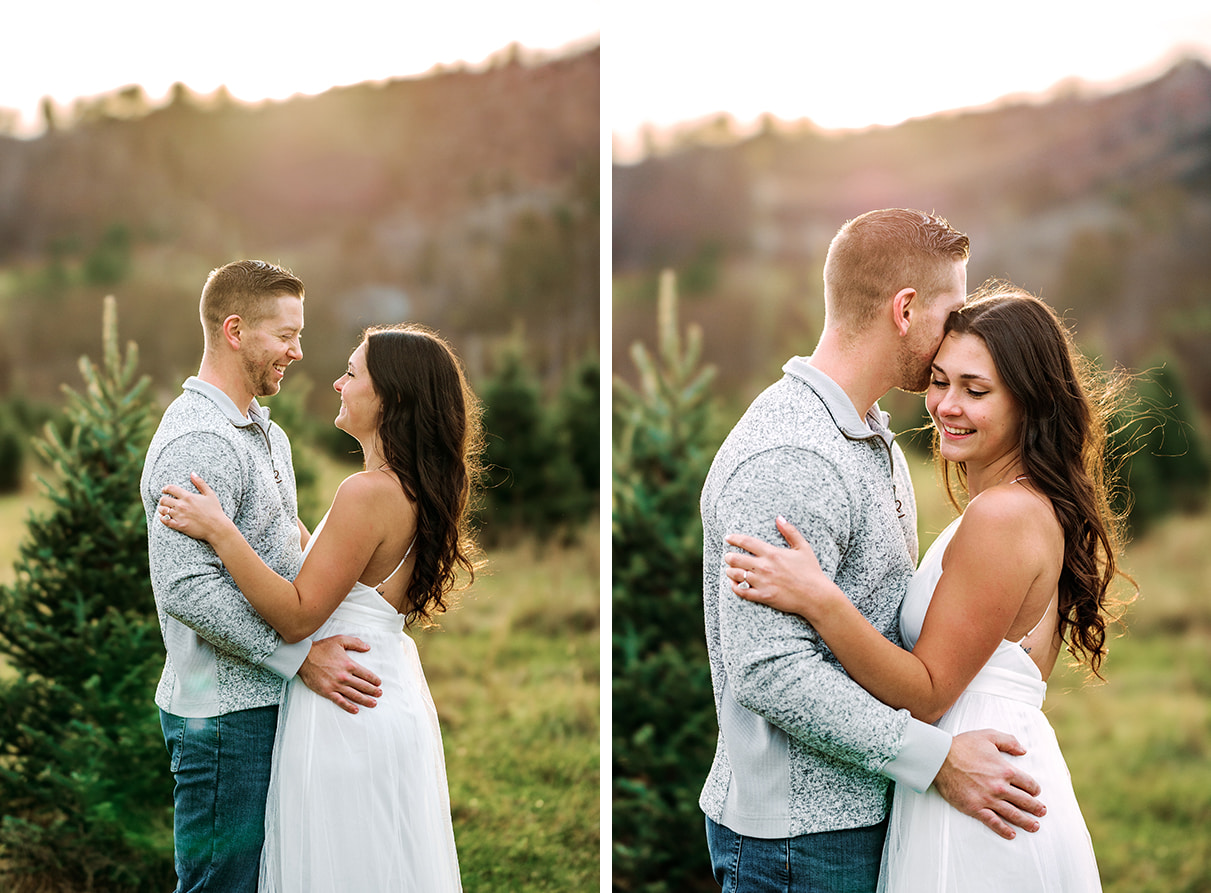 Engaged couple embraces and smiles during engagement session at Christmas Tree Farm in Bainbridge NY