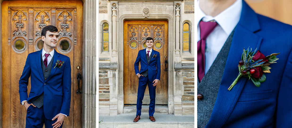 groom in blue suit with red boutonniere poses for wedding photos in ithaca