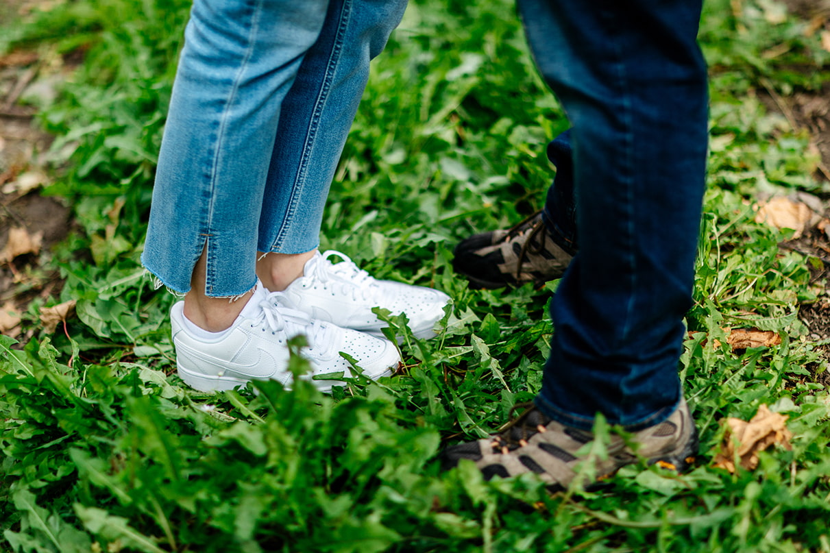 Couples shoes standing in Finger Lakes Vineyard at at Bet the Farm Winery in Trumansburg NY