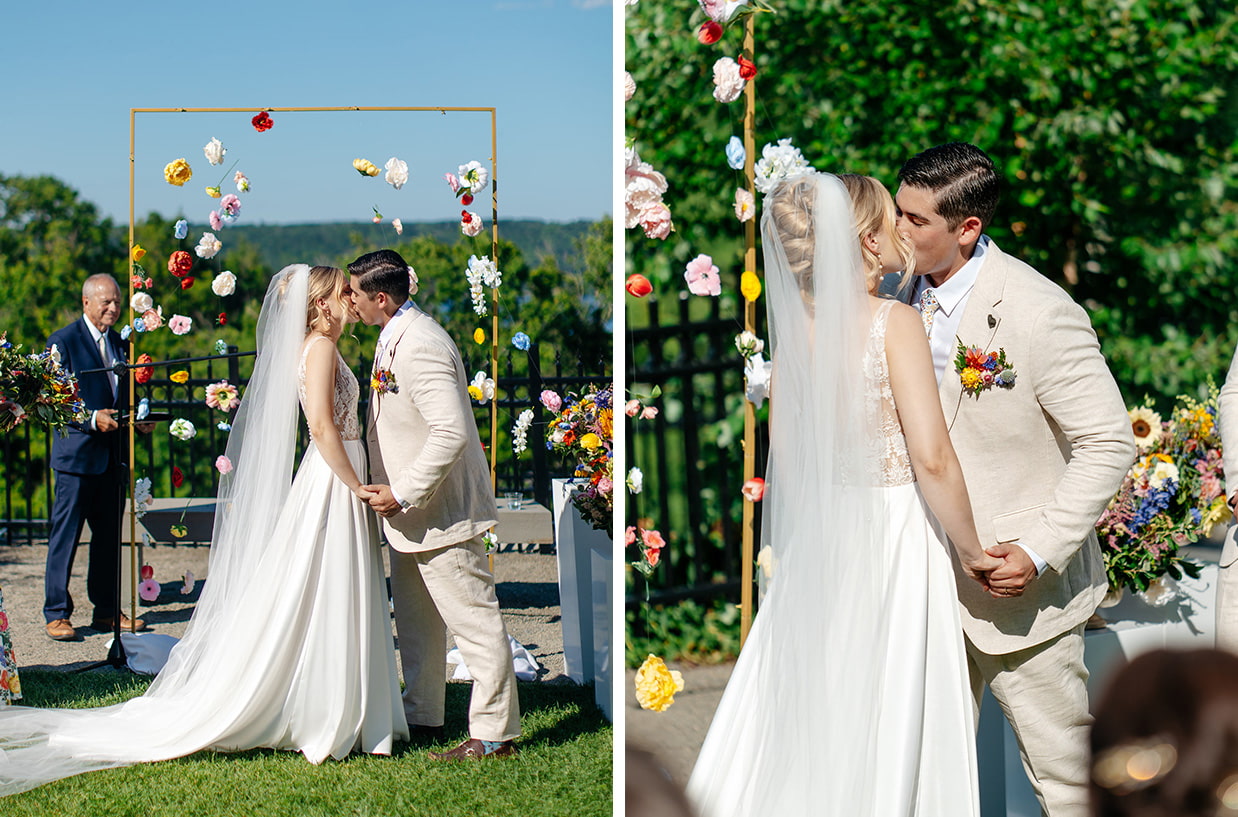 Bride and groom share first kiss during their wedding ceremony at The Inn at Taughannock Falls