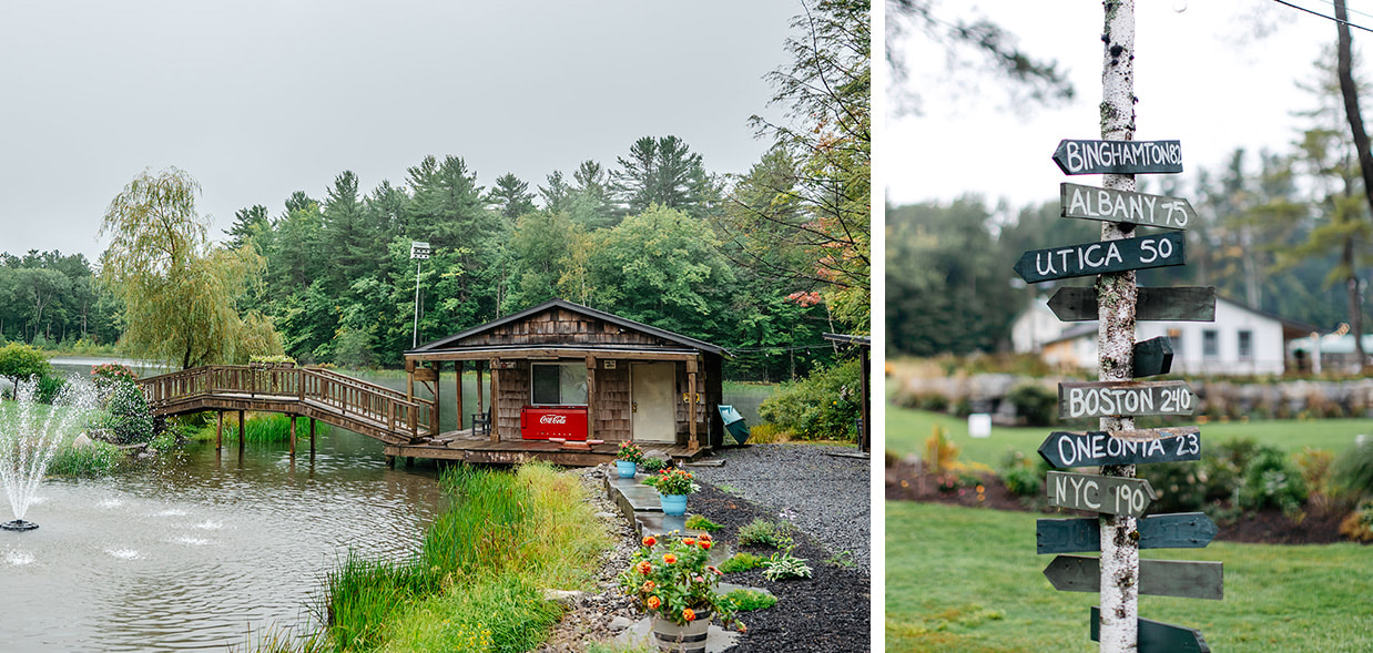 Rustic boathouse and bridge sitting on the edge of Spano Lake and signs pointing to the nearest towns and how many miles away they are