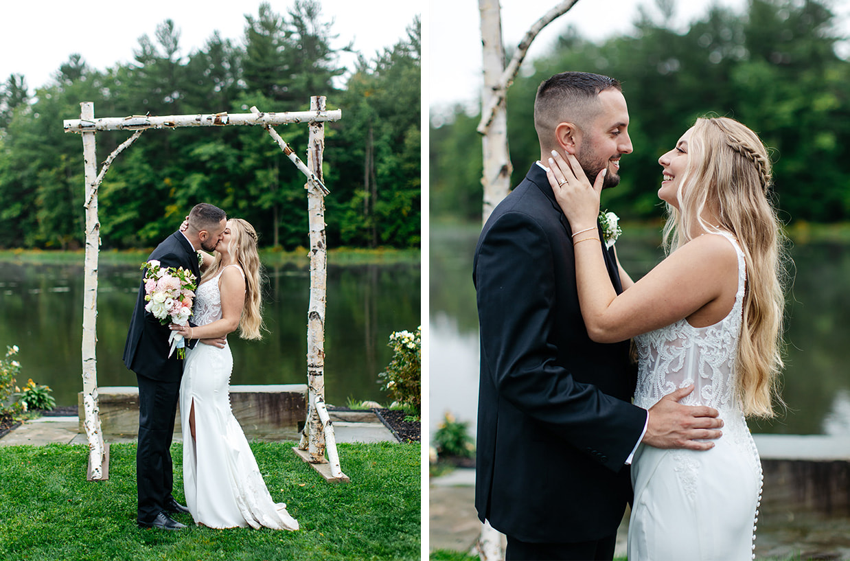 Bride and groom share a kiss in front of birch arbor