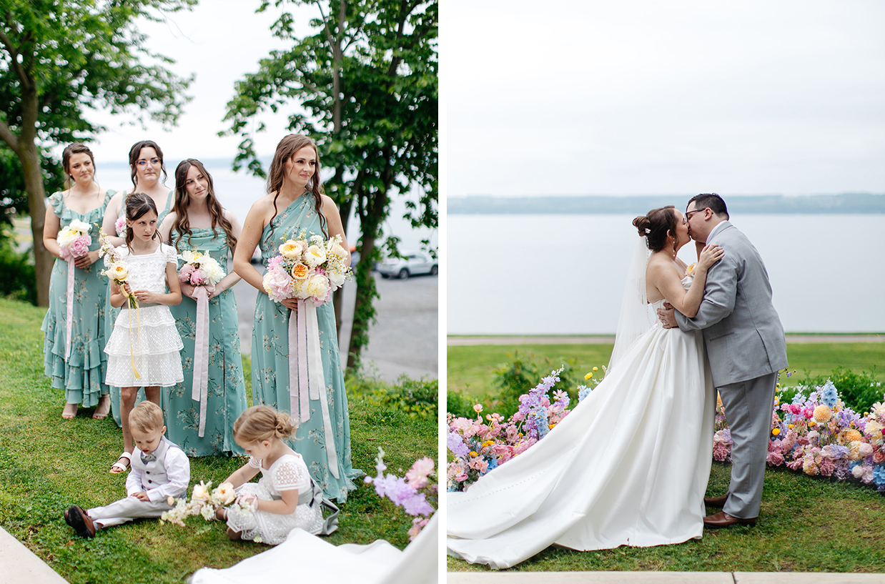 Bride and Groom share their first kiss while the bridesmaids watch and smile at The Vista at Seneca Lake Resorts in Romulus, NY