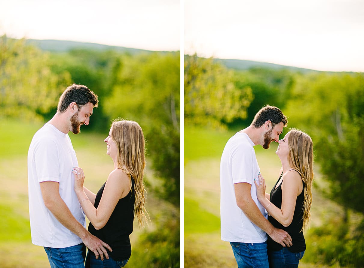 Couple embraces on hill in Albany NY