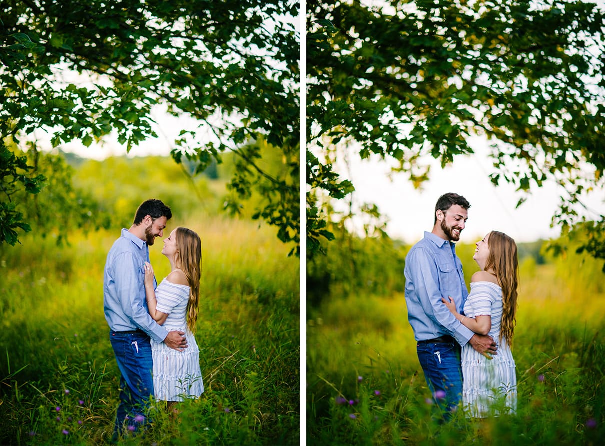 Couple embraces in field while framed by trees Albany NY