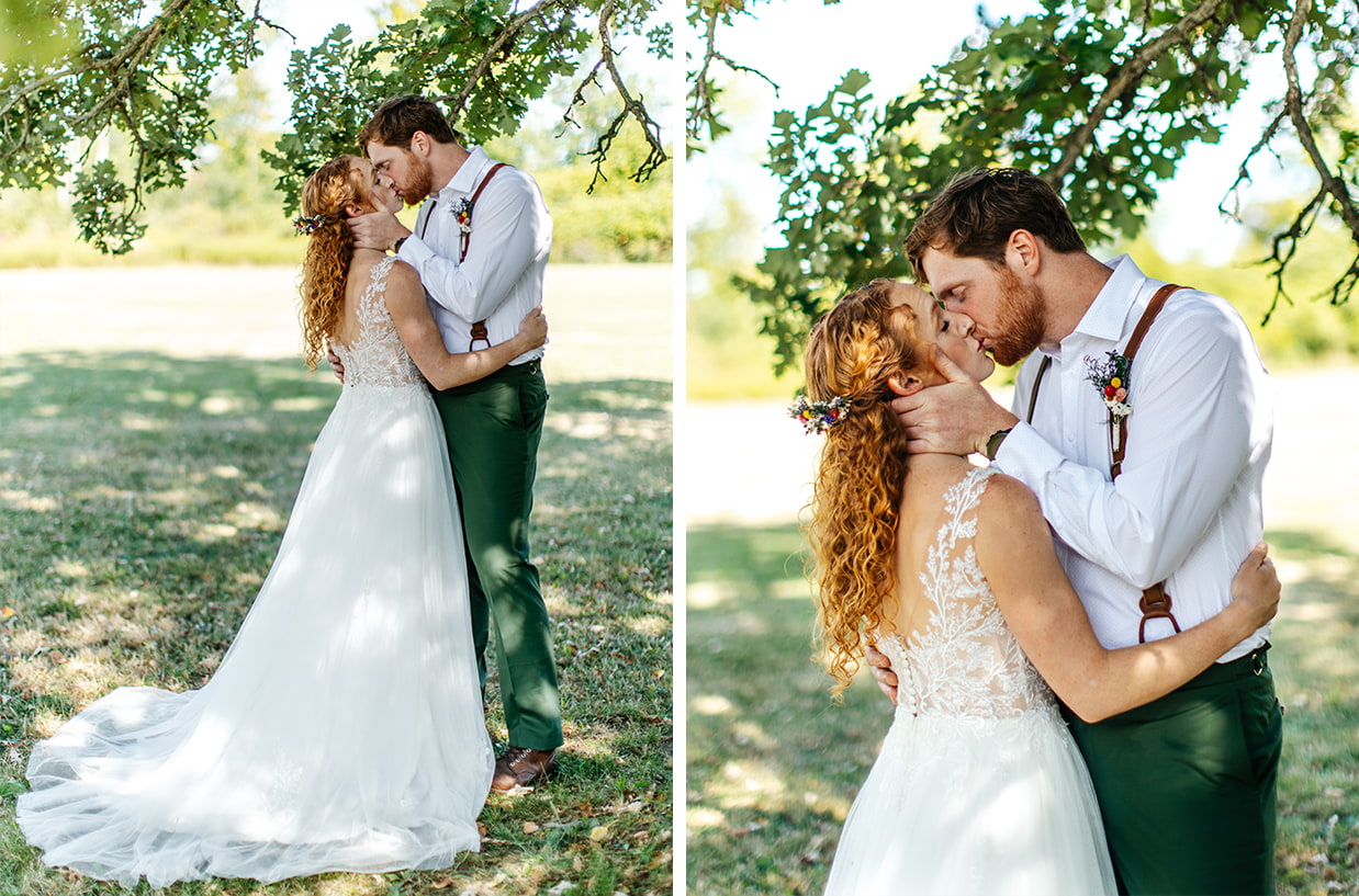 bride and groom kiss under the apple trees at Apple Blossom Acres in Freeville NY