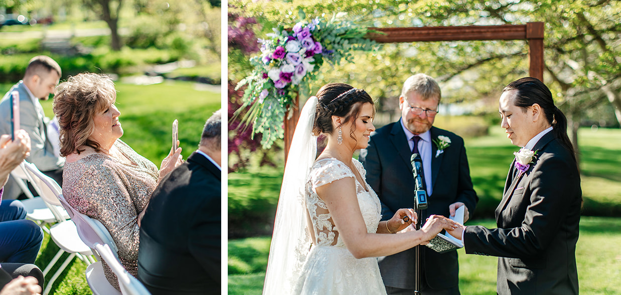 bride and groom exchange rings during outdoor wedding ceremony at canfield casino in saratoga springs ny while brides mom watches