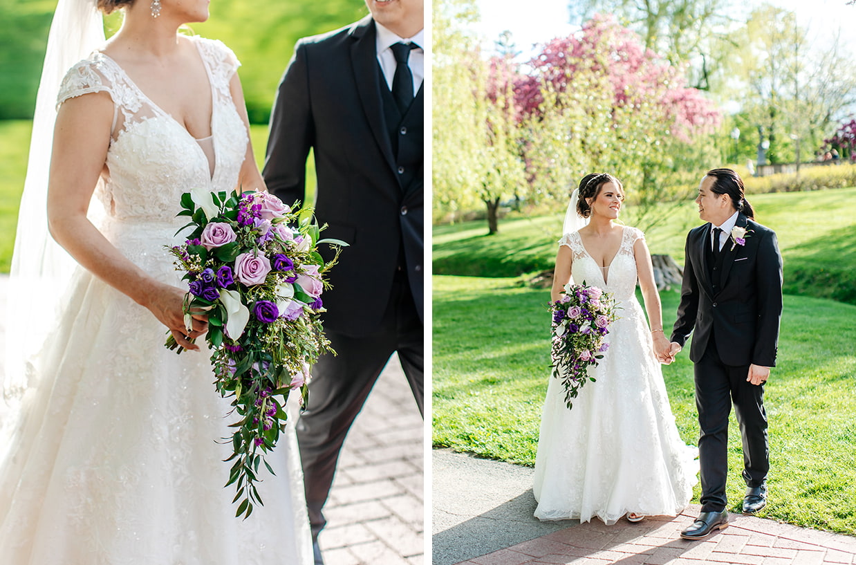 bride and groom hold hands and smile while holding a bouquet of purple flowers in congress park in saratoga springs ny