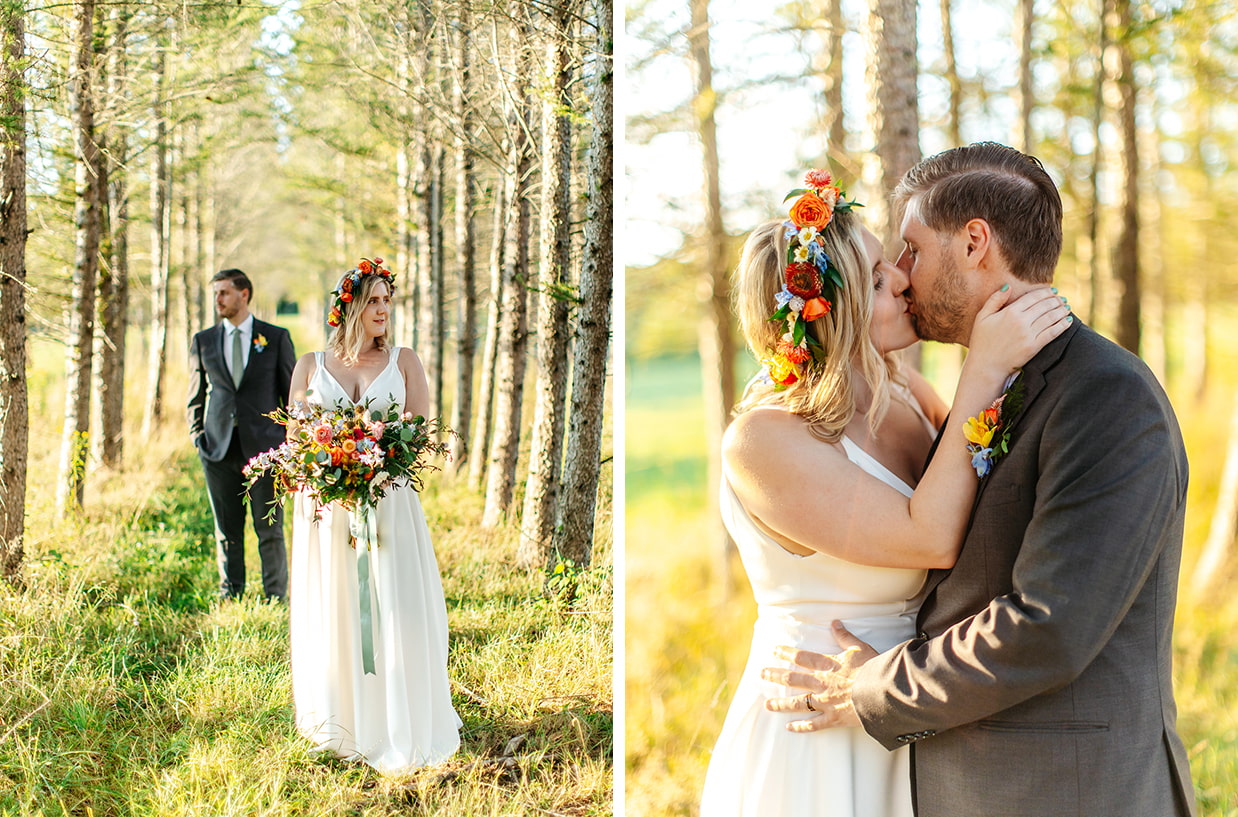 Groom and Bride in red orange and yellow flower crown stand among a line of birch trees and kiss during golden hour in the catskills