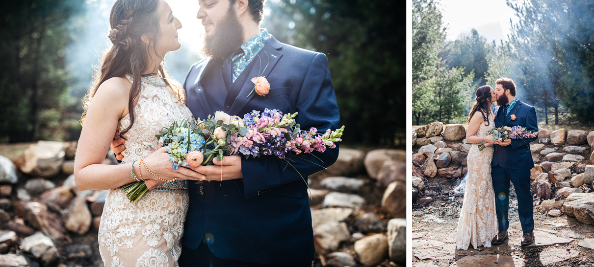couple holds colorful presentation bouquet while kissing in front of bonfire