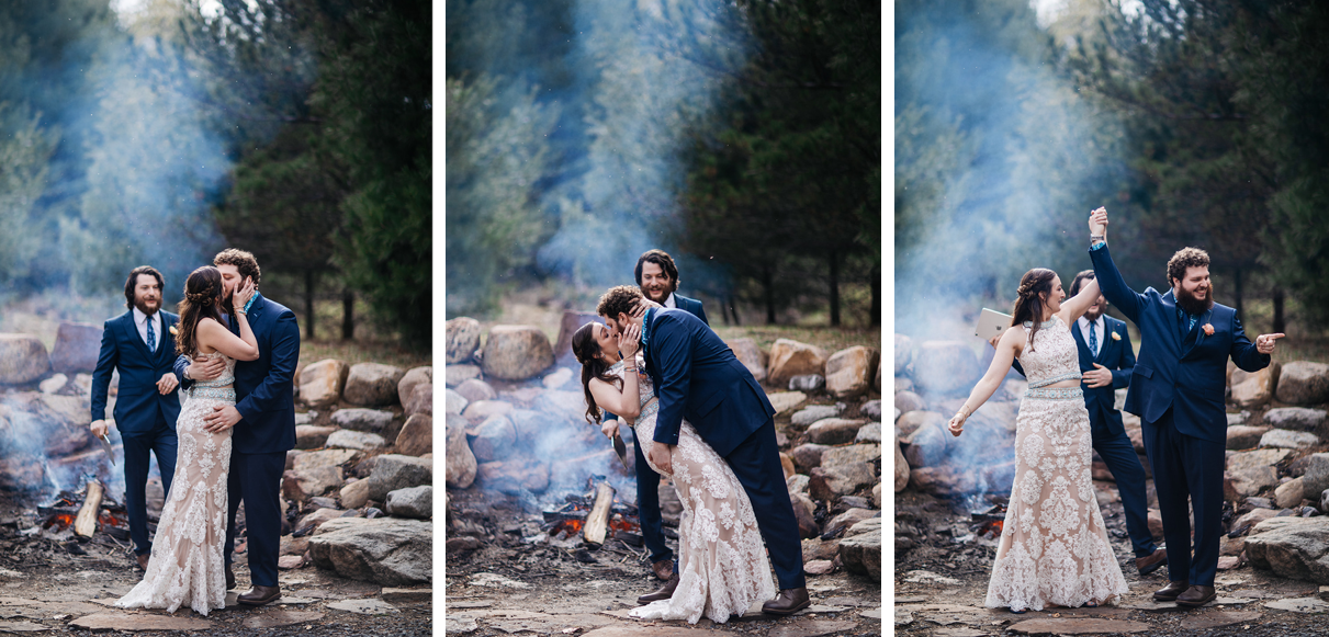couple have first kiss in front of bonfire in adirondacks wedding