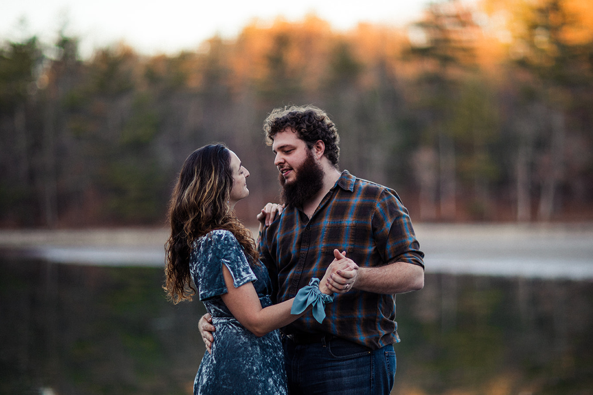 Couple dances during their engagement session at Chenango Valley State Park