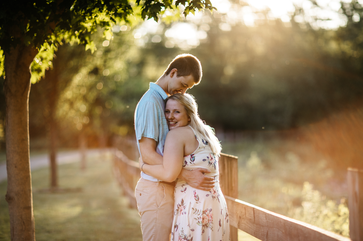 Couple embraces and smiles in Keith Clark Park Sidney NY