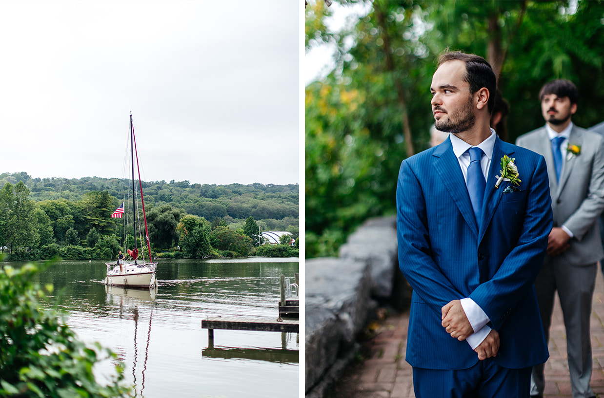 Groom watches bride make her entrance on a sailboat on the dock at Ithaca Farmers Market in Ithaca NY