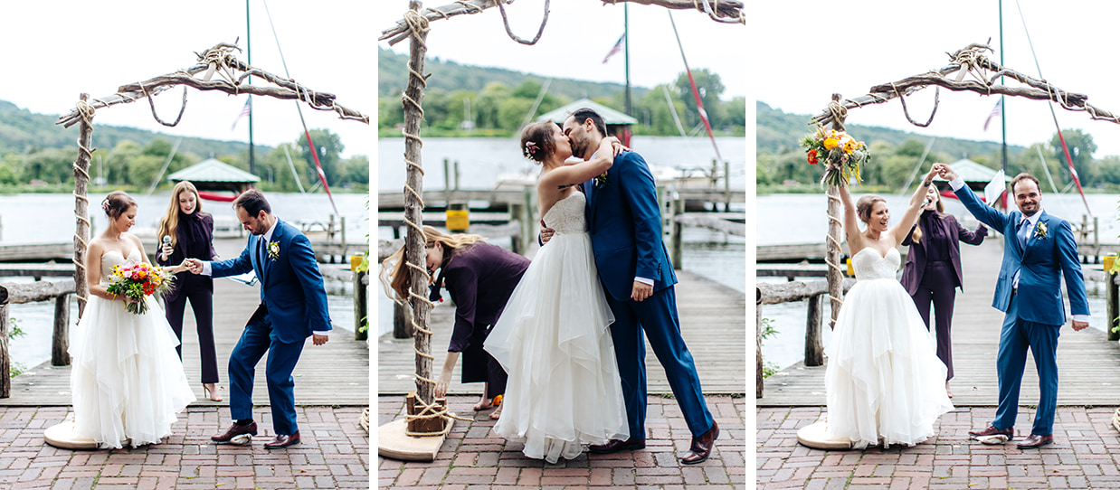 bride and groom share first kiss and breaks a glass at Jewish wedding at Ithaca Farmers Market