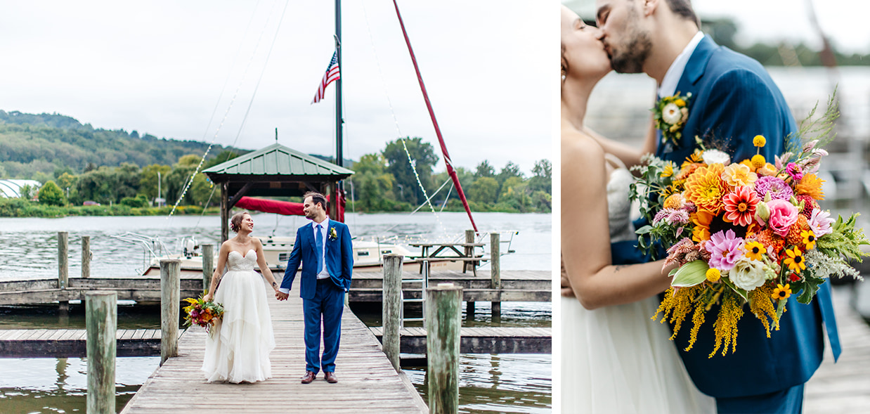 bride and groom hold hands and a colorful bridal bouquet on the dock at Ithaca Farmers Market