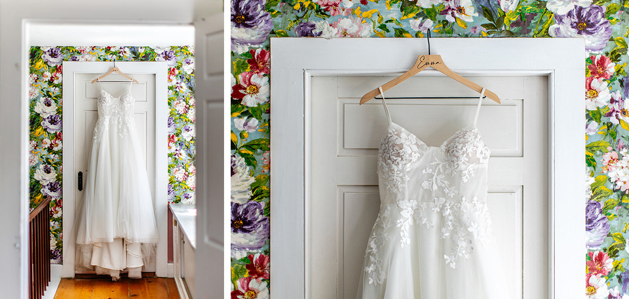 wedding dress hanging on door with colorful pink, purple, and blue floral wallpaper