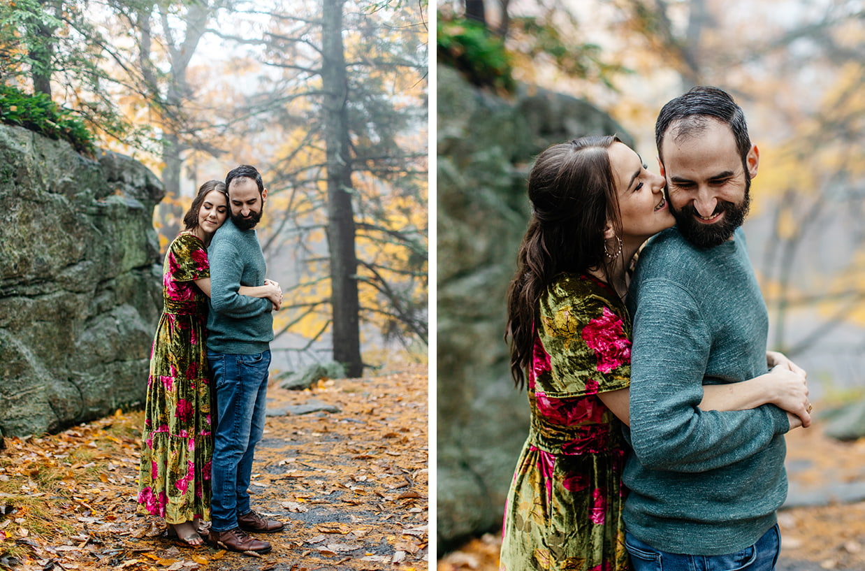 woman hugs man front behind and they smile for their engagement photos at Minnewaska State Park in Kerhonkson, NY
