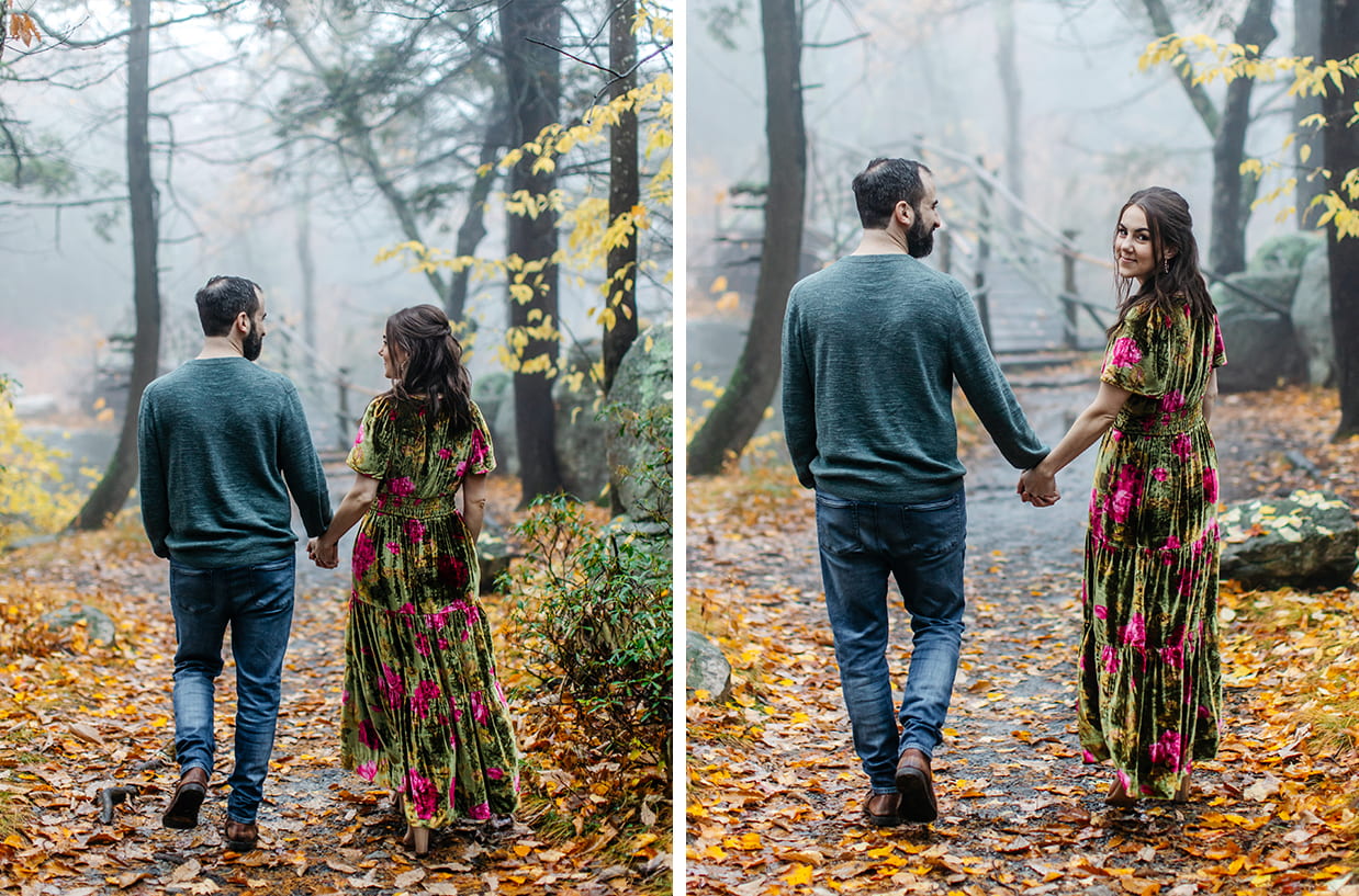 Couple walks down foggy path while holding hands at Minnewaska State Park in Kerhonkson, NY