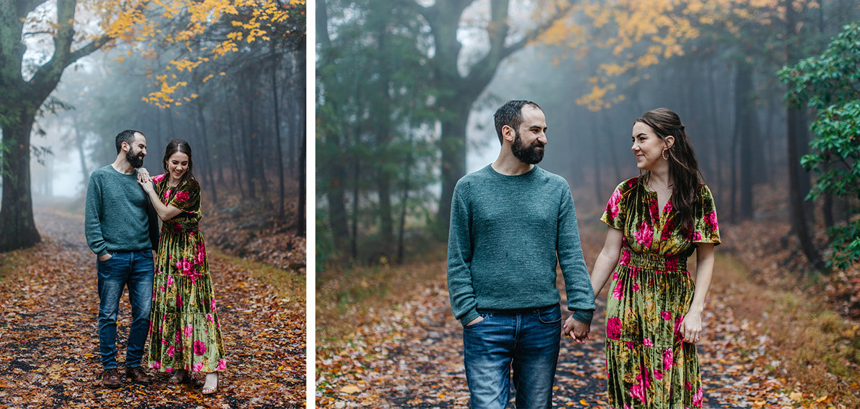 couple smiles and laughs on a foggy path through the woods at Minnewaska State Park in Kerhonkson, NY
