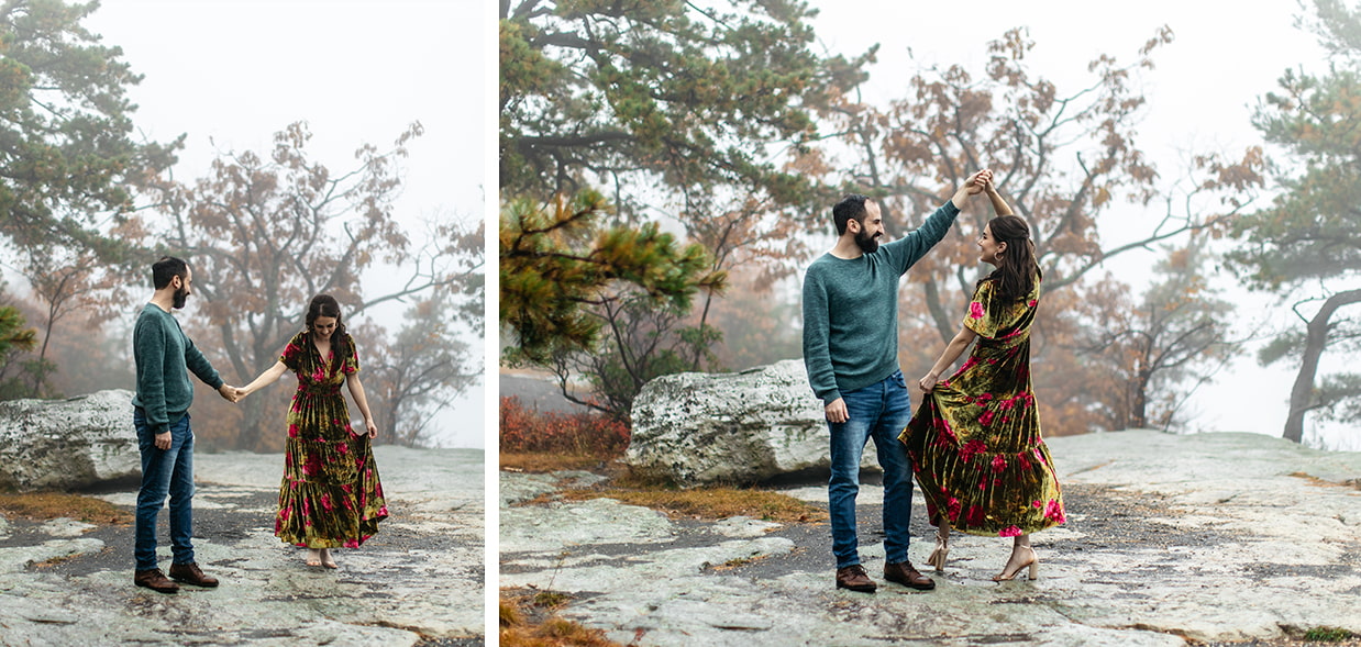 Man holds woman's hand while she twirls in a velvet dress during engagement photos at Minnewaska State Park in Kerhonkson, NY