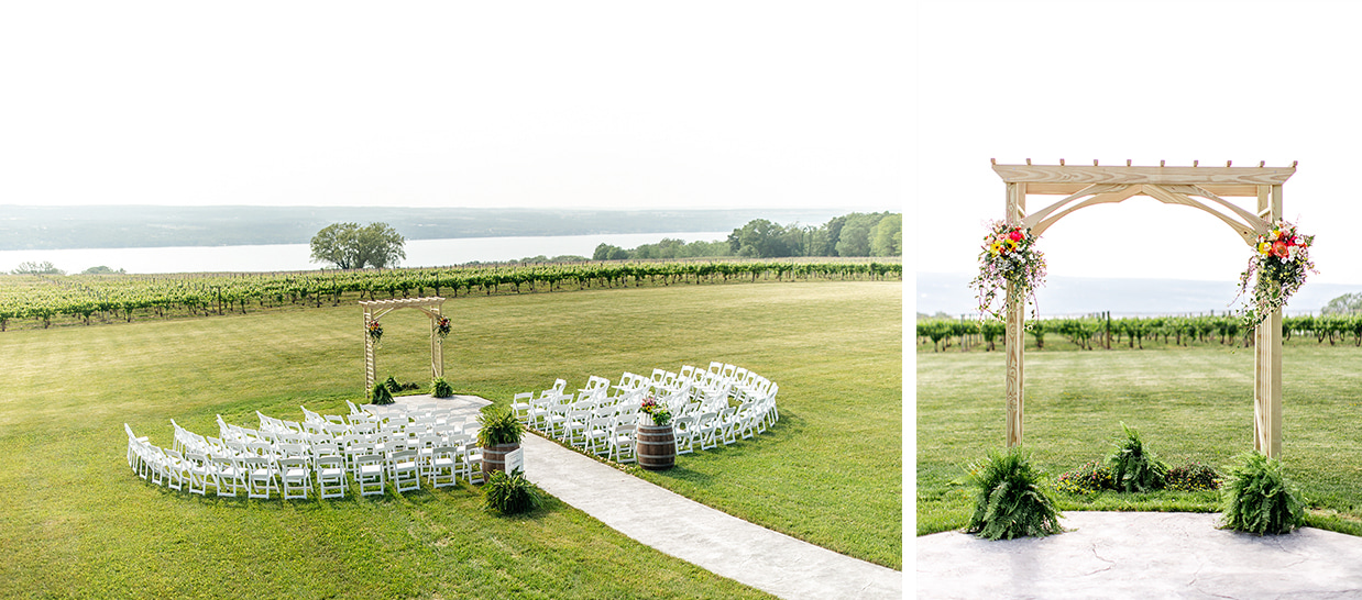 Wedding Ceremony space with decorated arch overlooking a vineyard and Seneca Lake at The Ginny Lee Cafe at Wagner Vineyards
