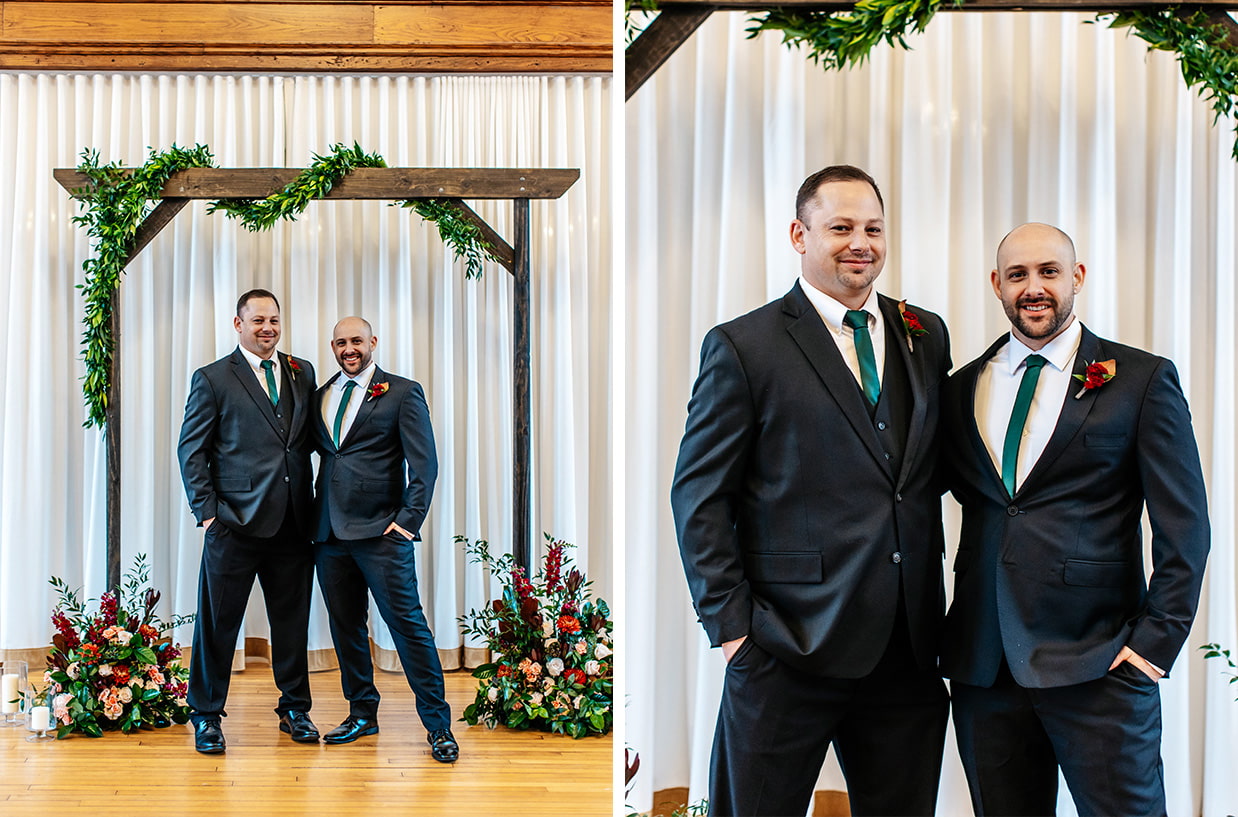 Groom and his brother smile and stand in front of ceremony arch at The Historic German House in Rochester NY