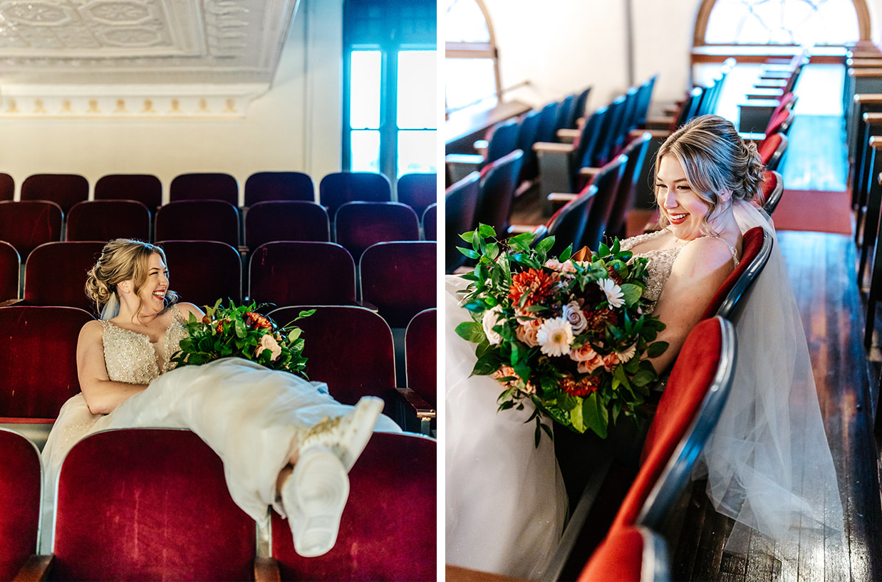 bride laughs and puts her feet up while sitting in theatre seats at The Historic German House in Rochester NY