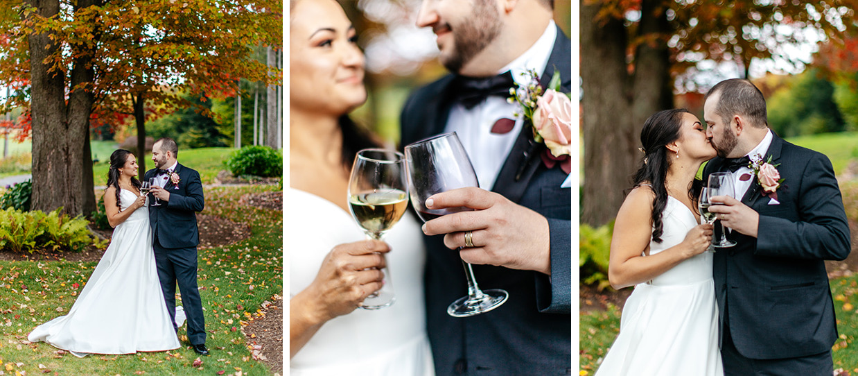 Bride and groom drink wine and share a kiss during cocktail hour in front of fall foliage at Shenendoah Clubhouse in Verona NY