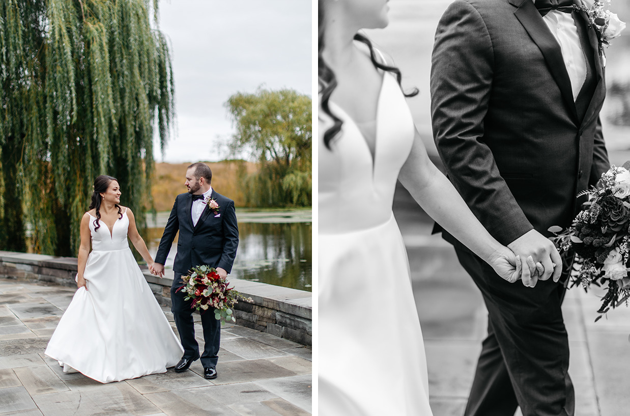 Bride and Groom hold hands and walk in front of weeping willow tree at The Lodge at Turning stone in Verona NY