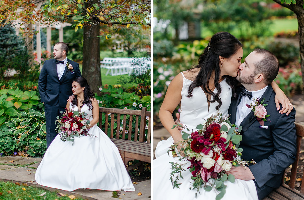 Bride and Groom kiss on a garden bench at The Lodge at Turning Stone in Verona NY
