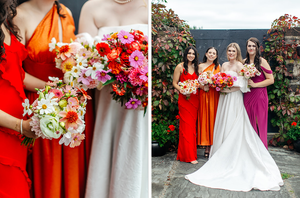 bride and bridesmaids in red, pink, and orange dresses stand holding colorful bouquets during modern wedding in the finger lakes