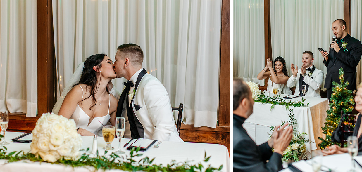 Bride and Groom kiss while sitting at sweetheart table during speeches at their winter wedding at The Gatsby